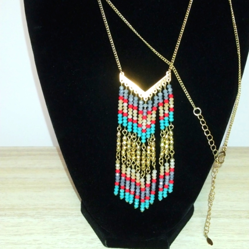 Premier goldtone beaded tassel long beautiful